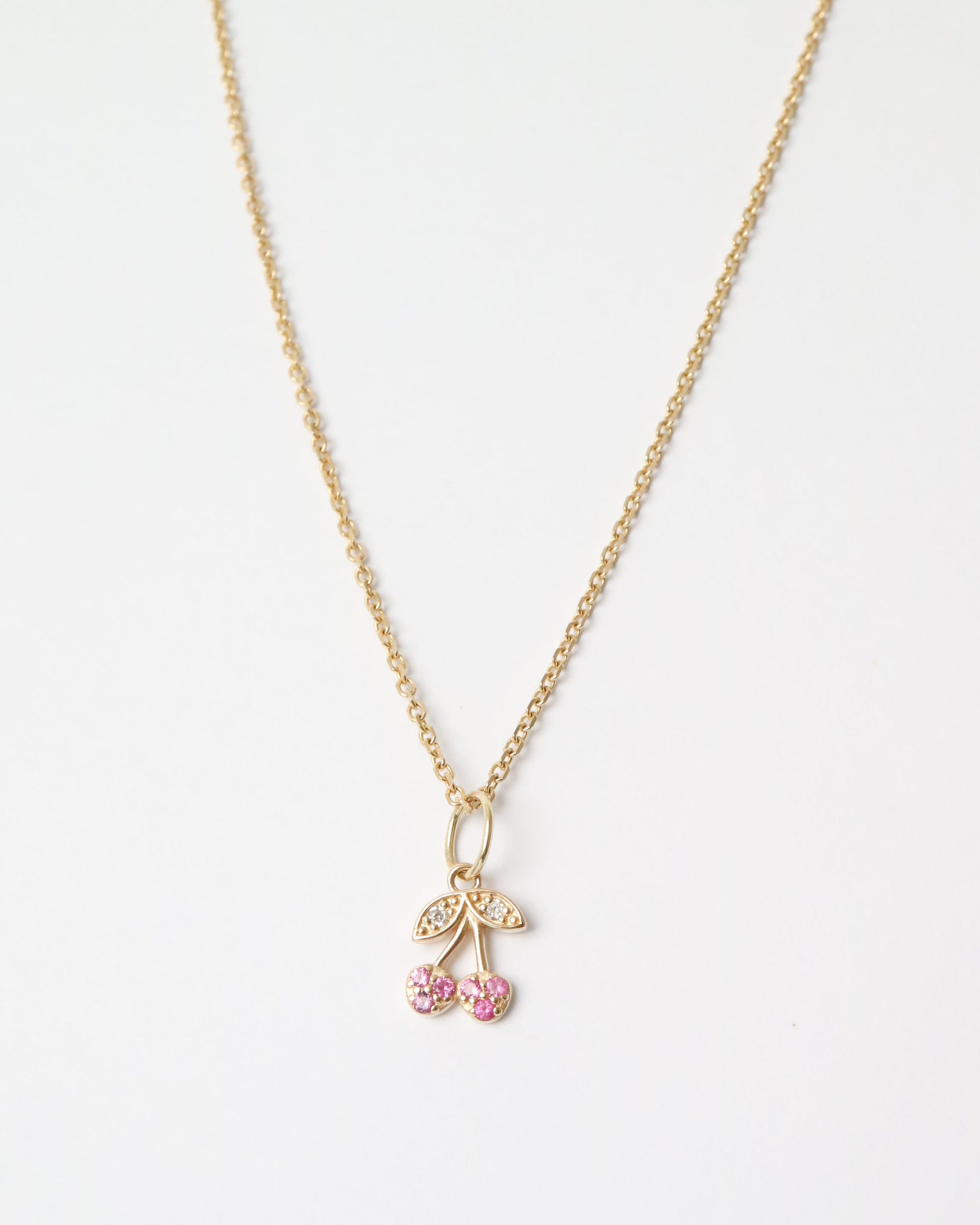 9ct gold Cherry Charm with rubies and diamonds on gold chain