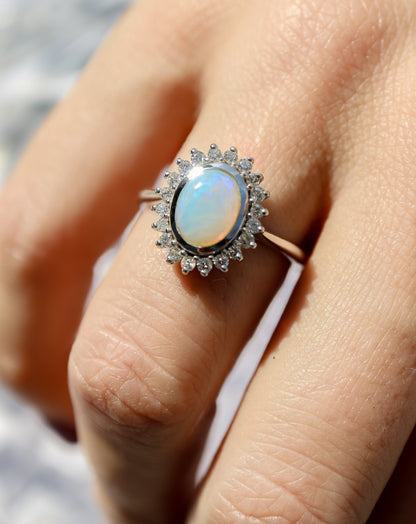 9ct white gold, opal and diamond halo statement ring