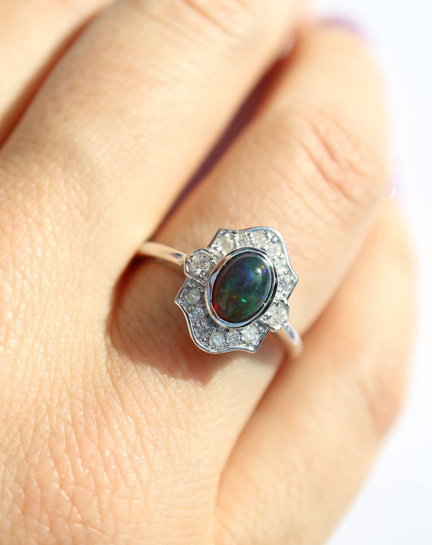 9ct white gold ring with Ethiopian opal and diamonds