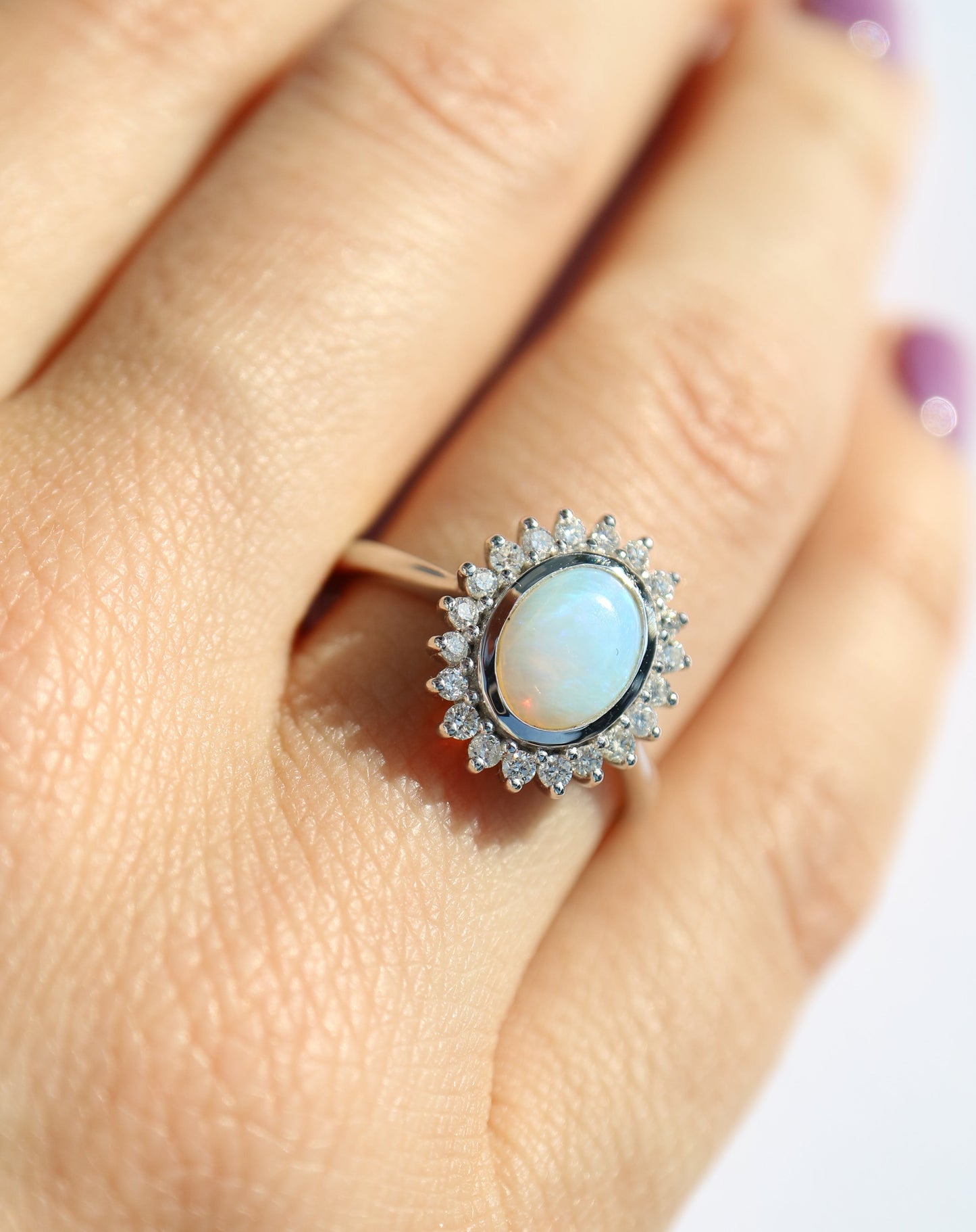 9ct white gold, opal and diamond halo statement ring