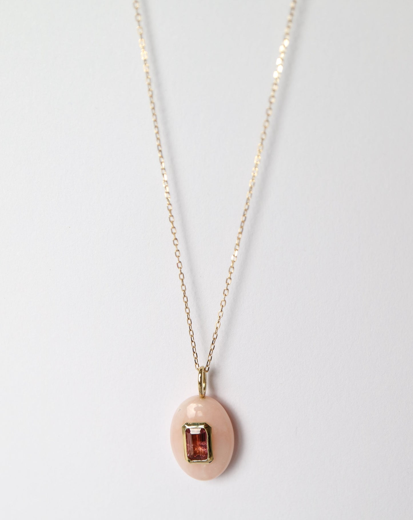 Gold and tourmaline oval pendant