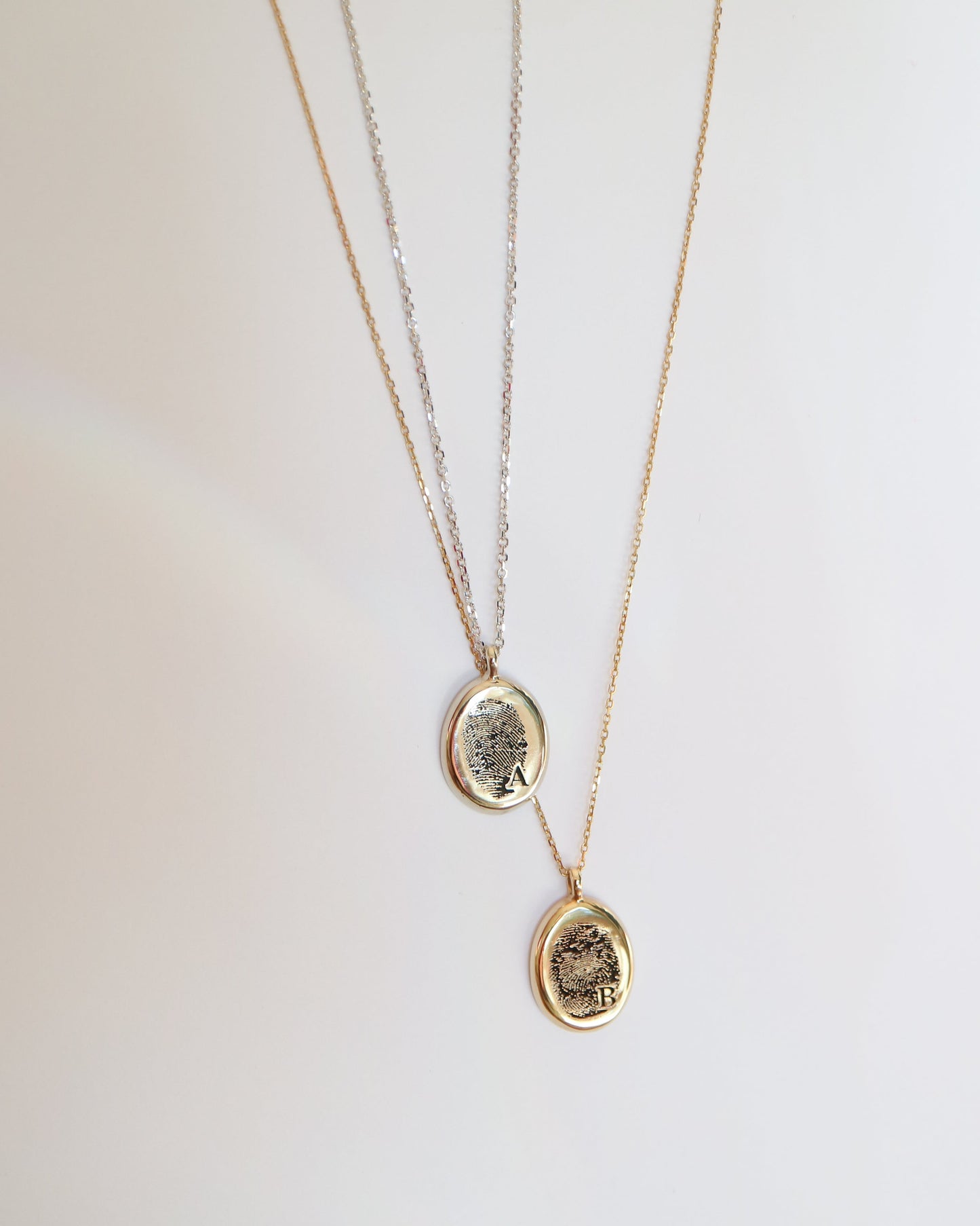 9kt gold Fingerprint Pendants on gold chains