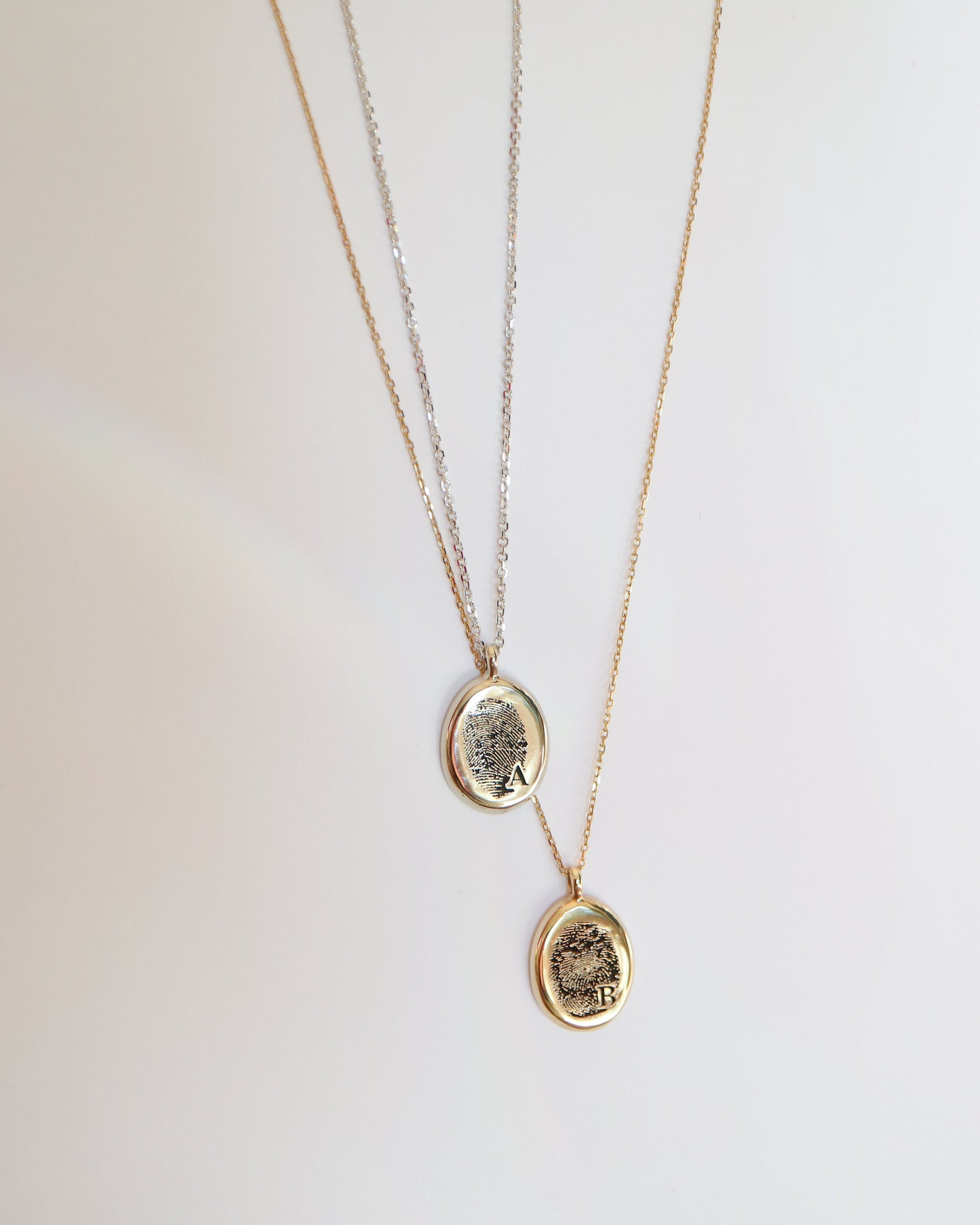 9kt gold Fingerprint Pendants on gold chains
