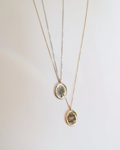 9kt gold Fingerprint Pendants on gold chains