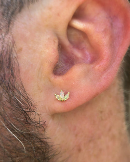 9kt gold and opal marquise stud earring in male ear