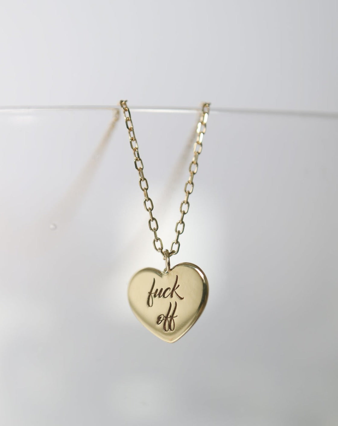 9kt gold Heart Pendant with "fuck off" engraved
