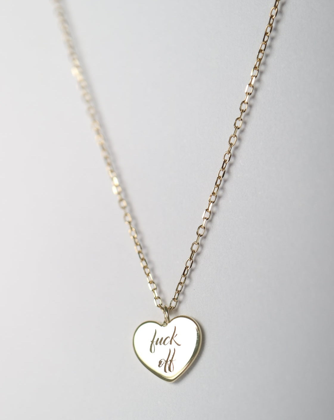 9kt gold Heart Pendant with "fuck off" engraved d