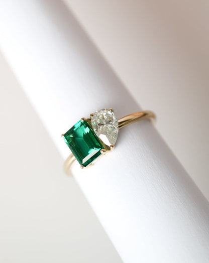 9kt gold Venus Ring with pear moissanite and emerald baguette