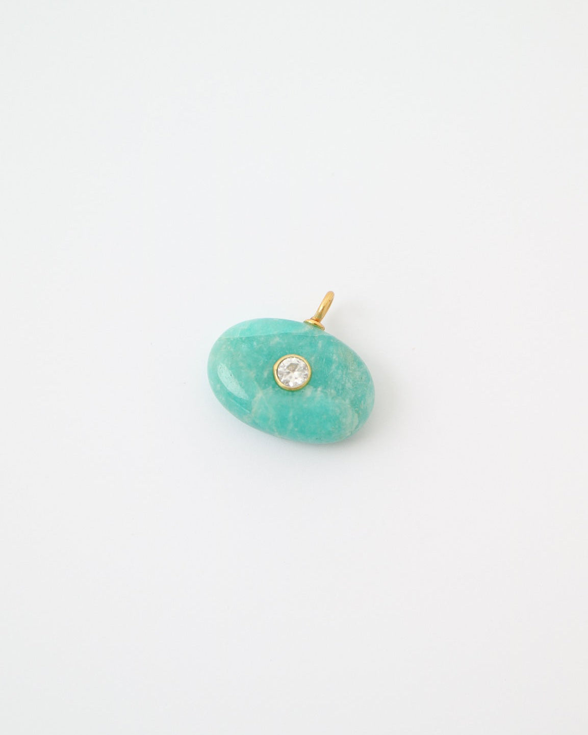 Amazonite Azure Charm featuring a polished oval amazonite gemstone with natural turquoise veining, a bezel-set cubic zirconia, and a gold plated sterling silver bail on a white background.