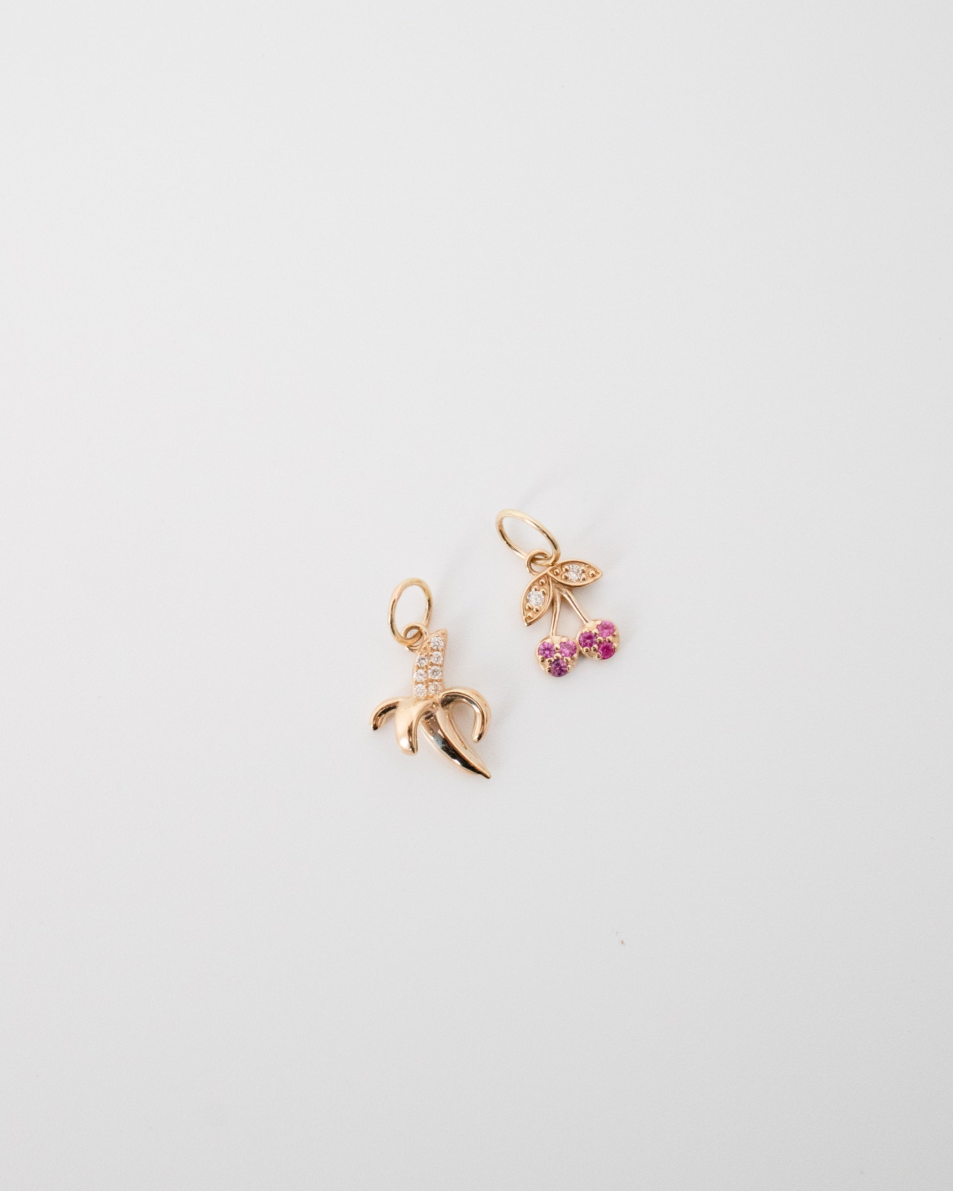Cherry charm in 9ct gold with banana charm in 9ct gold