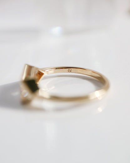 Gold ring on a white background