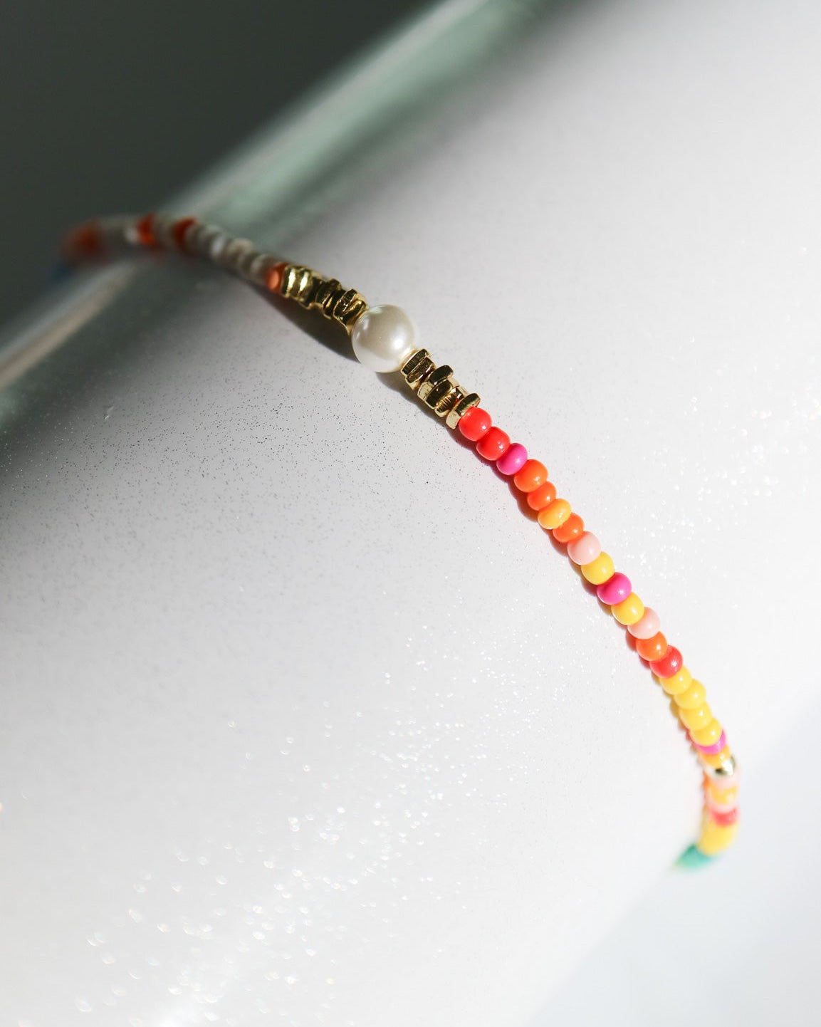 Colourful beaded and pearl bracelet finished with 14kt gold plated sterling silver