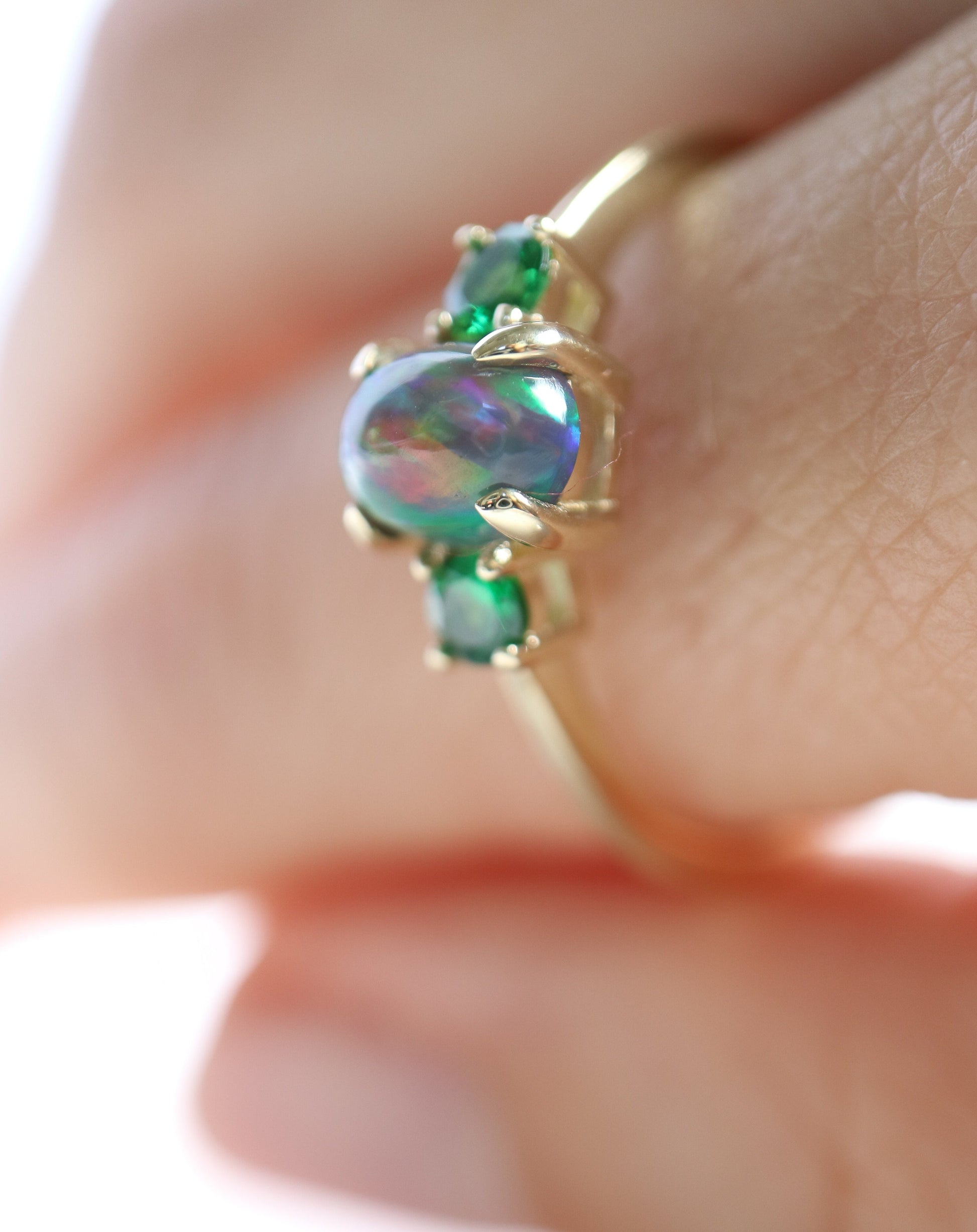 9ct gold ring with Ethiopian opal and tsavorite