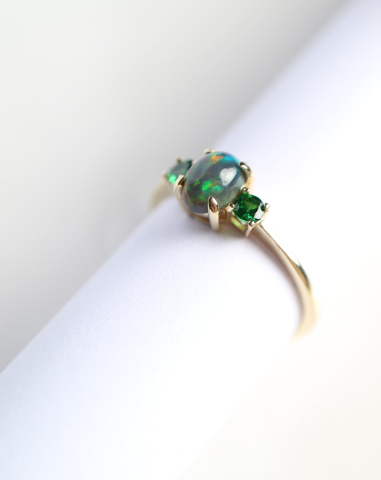 9ct gold ring with Ethiopian opal and tsavorite