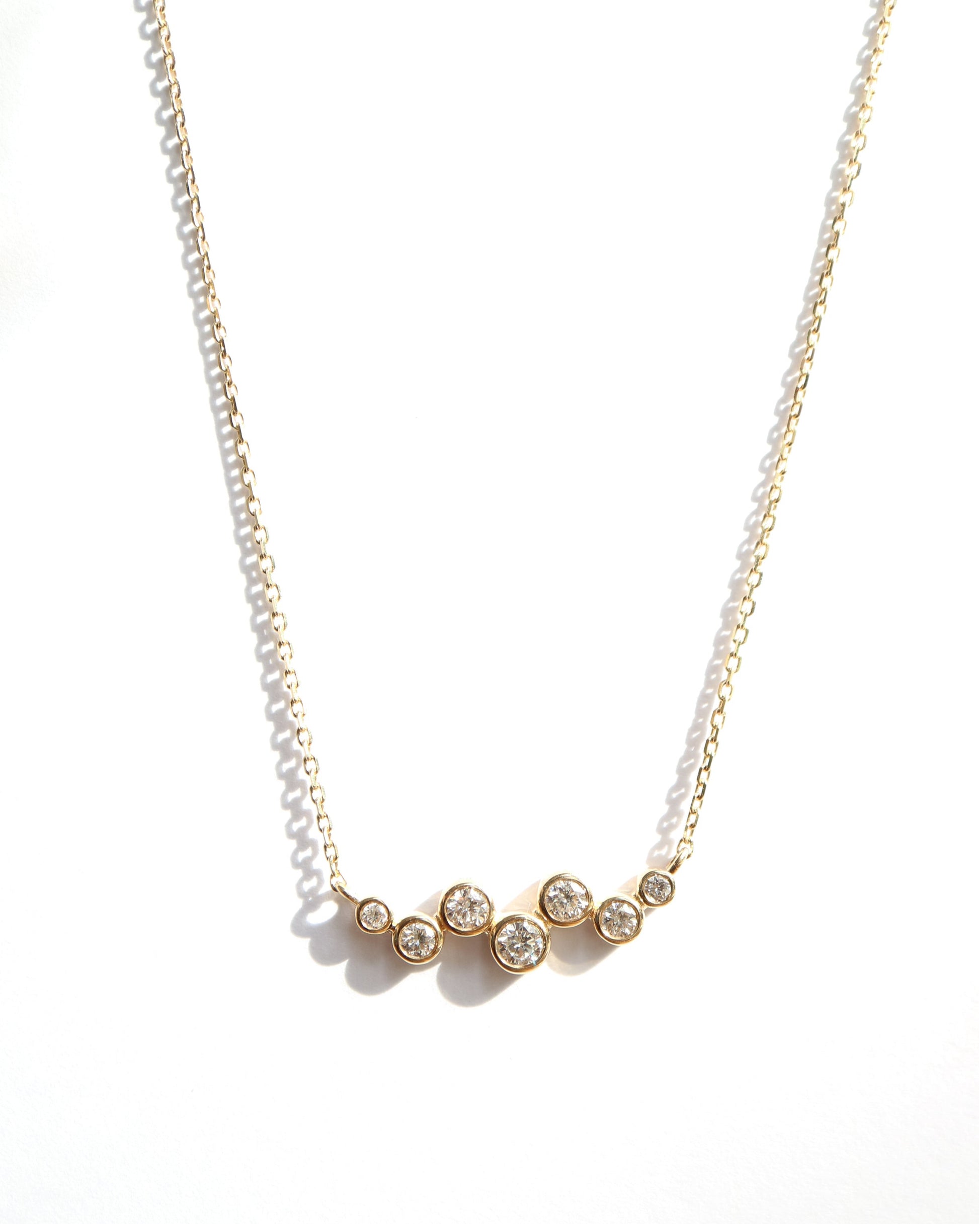 9ct gold necklace with seven round diamonds