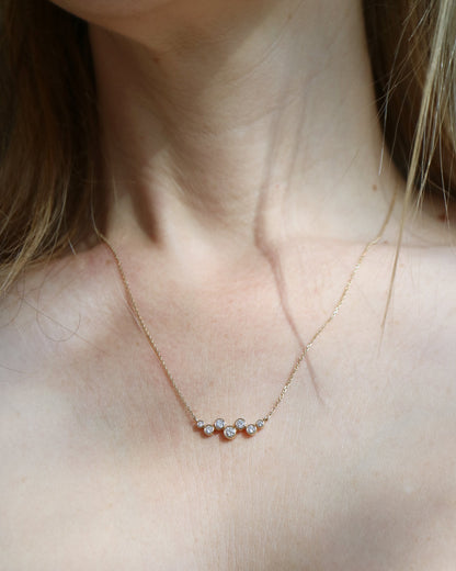 9ct gold necklace with seven round diamonds