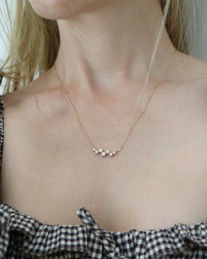 9ct gold necklace with seven round diamonds