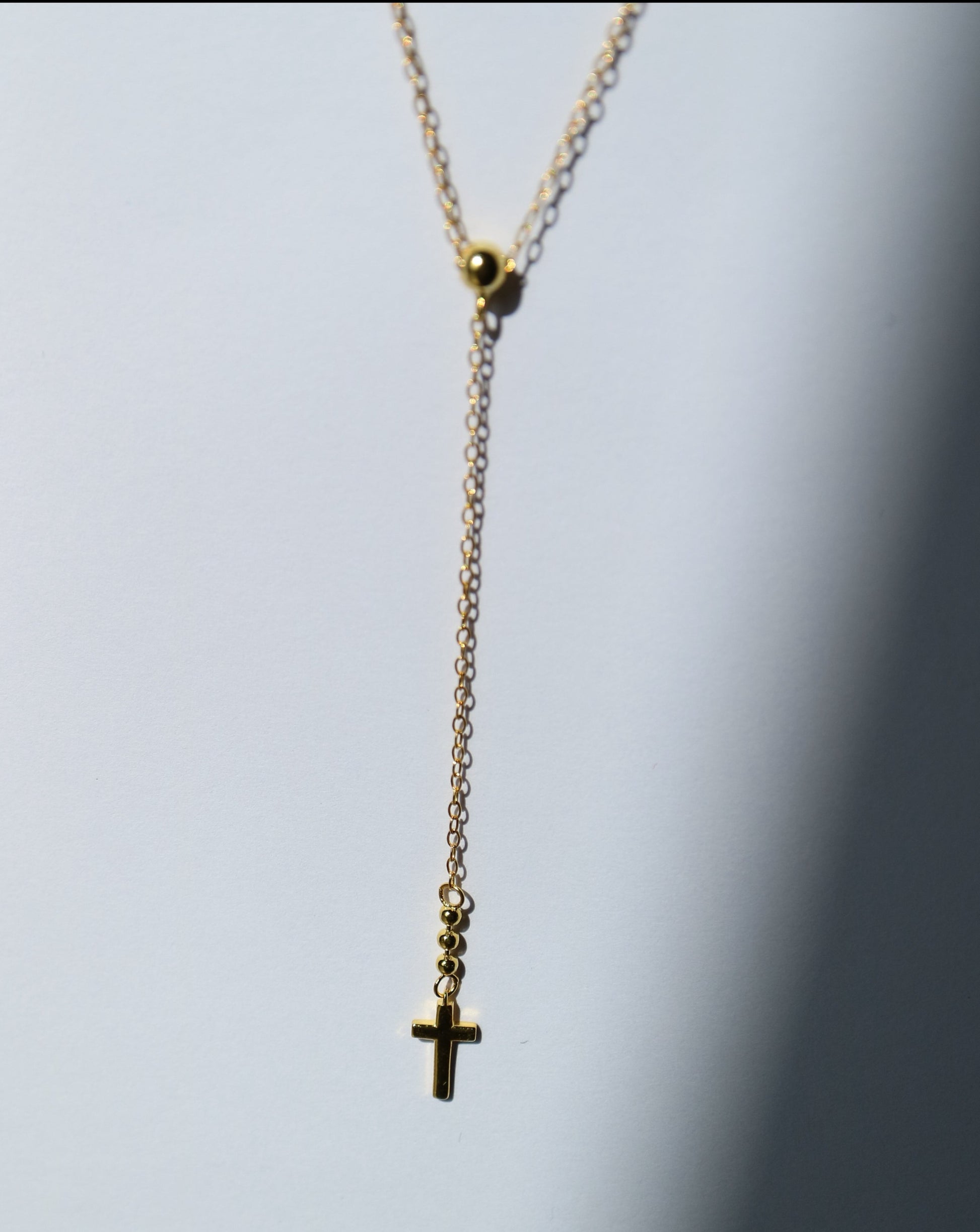 Crucifix Lariat Pendant in gold