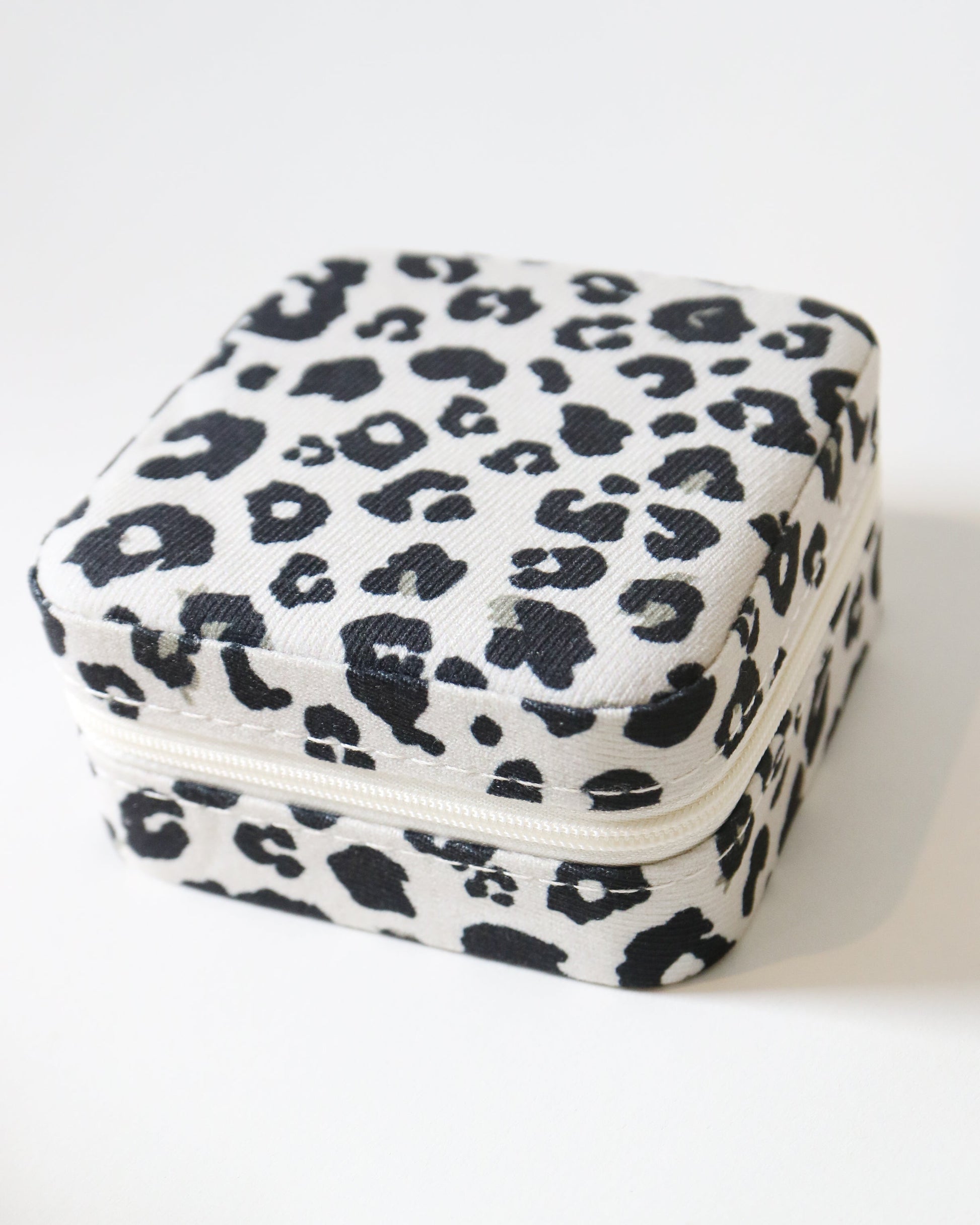 Hexagonal jewelry box with leopard print pattern on a white background