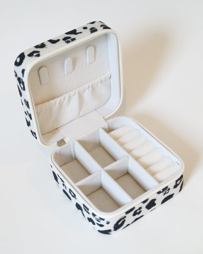 Jewelry box with leopard print exterior and white interior