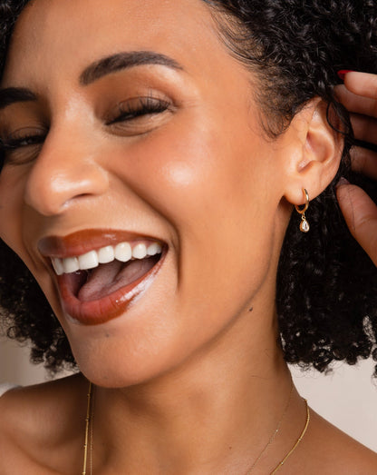 Lily Hoop Earrings on smiling model