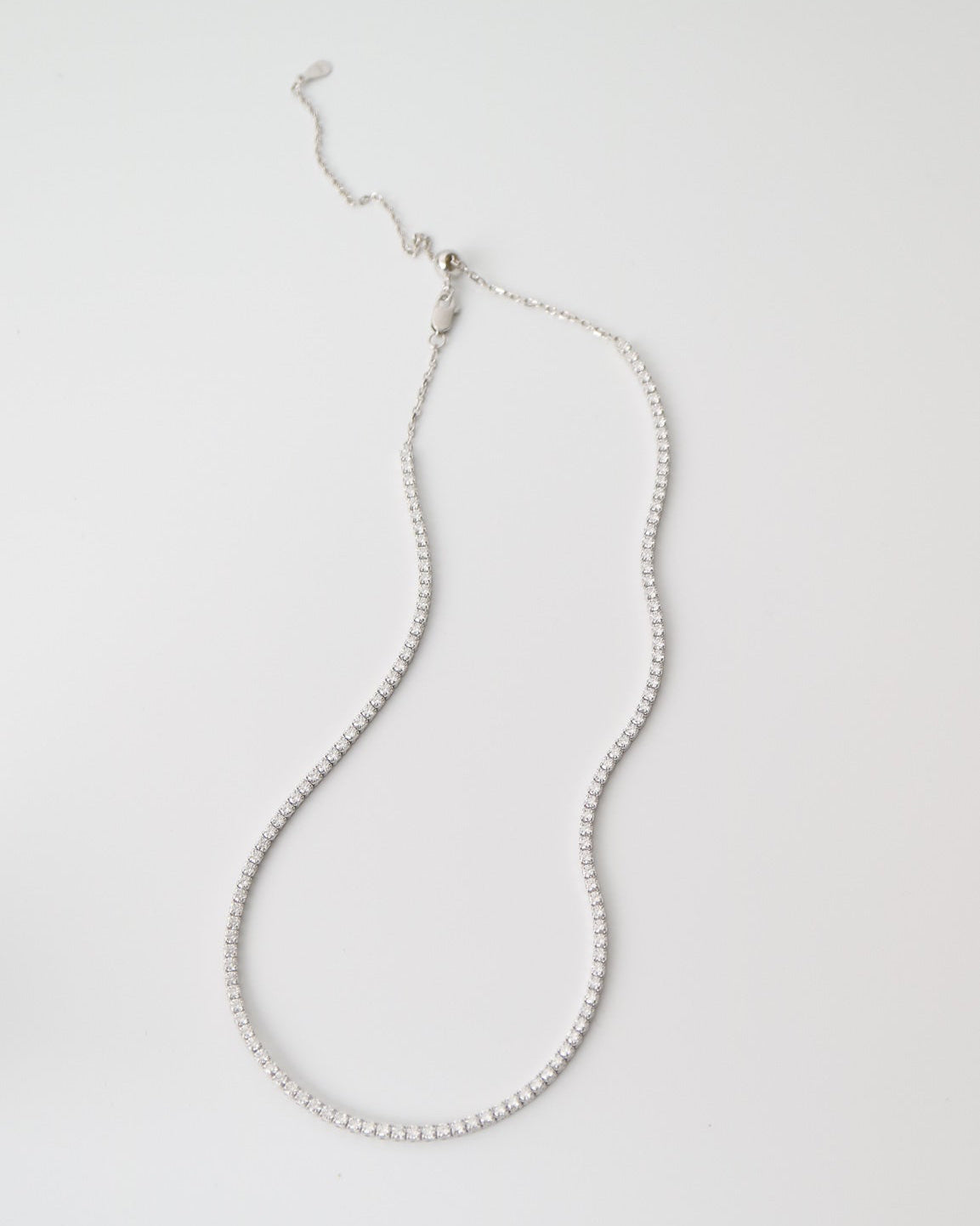 Luna Tennis Choker in S925 sterling silver featuring a row of brilliant moissanite stones