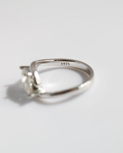 Marquise cut moissanite ring in sterling silver with minimalist wrap band