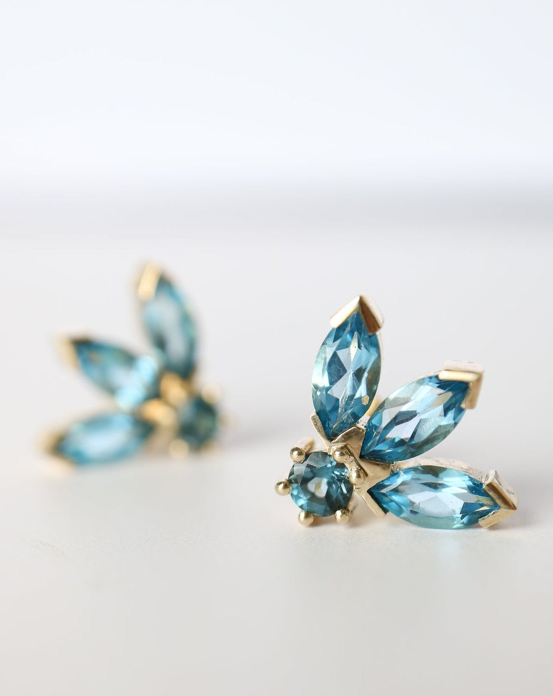 Milli the Brand 9ct gold earrings with blue topaz