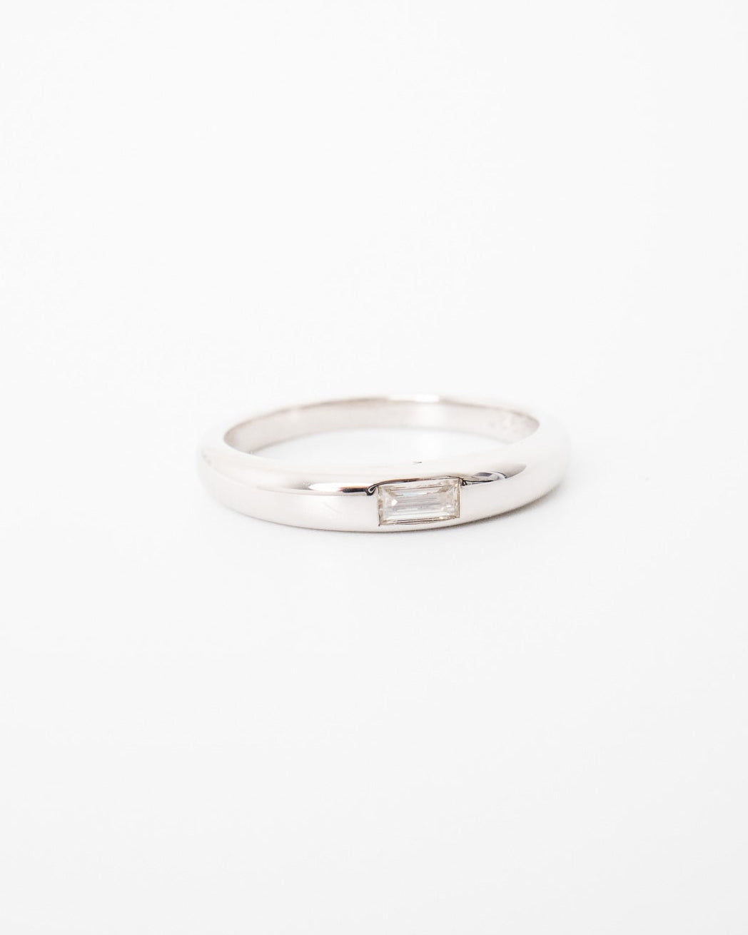 Silver ring on a white background