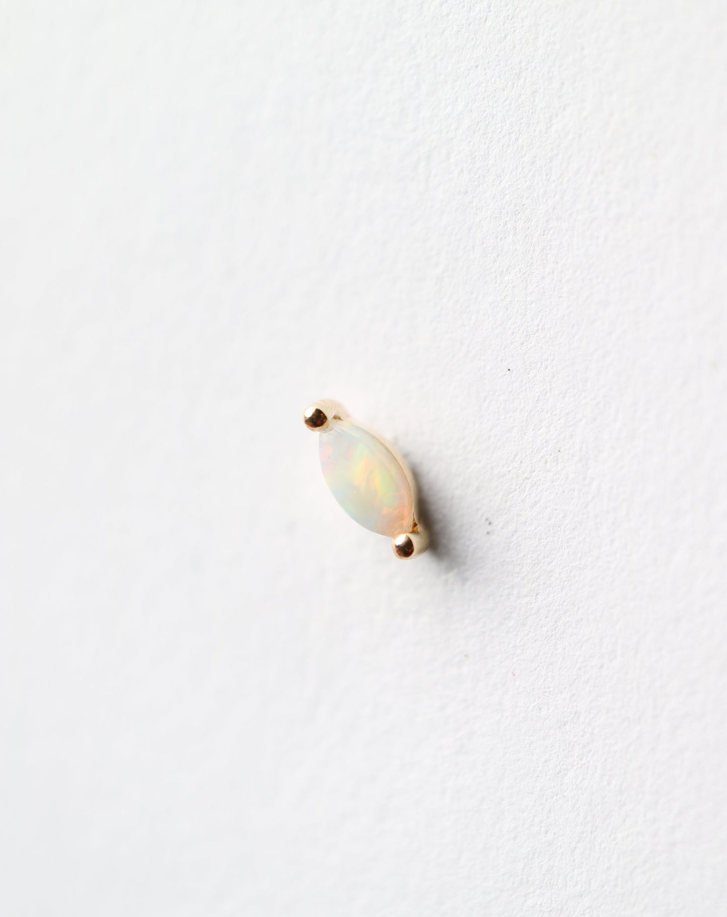 14kt Opal Conch Stud piercing