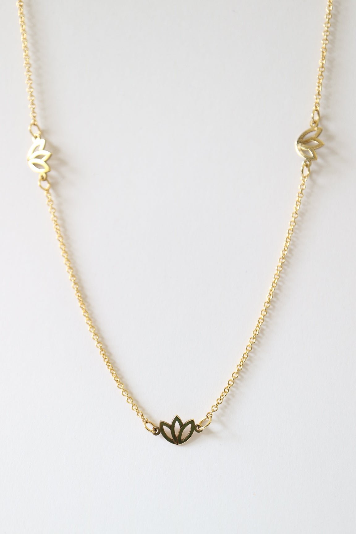 9ct gold necklace with three protea flowers from Collective & Co Jewellery