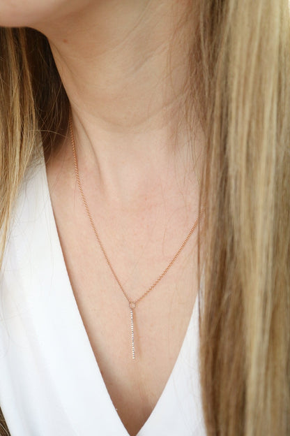 Diamond Bar Necklace on female neck