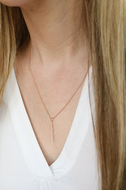 Diamond Bar Necklace on female neck