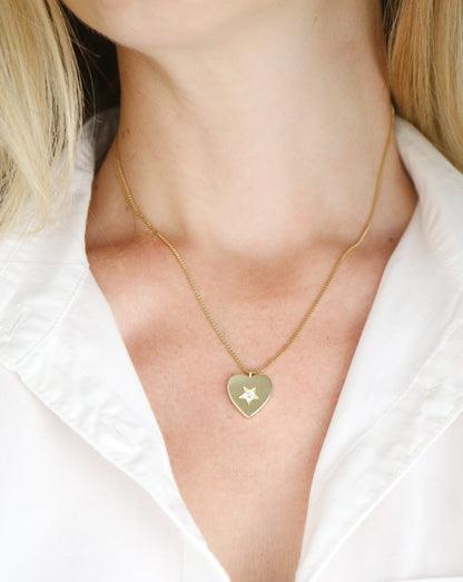 Star of my Heart Necklace on female neck