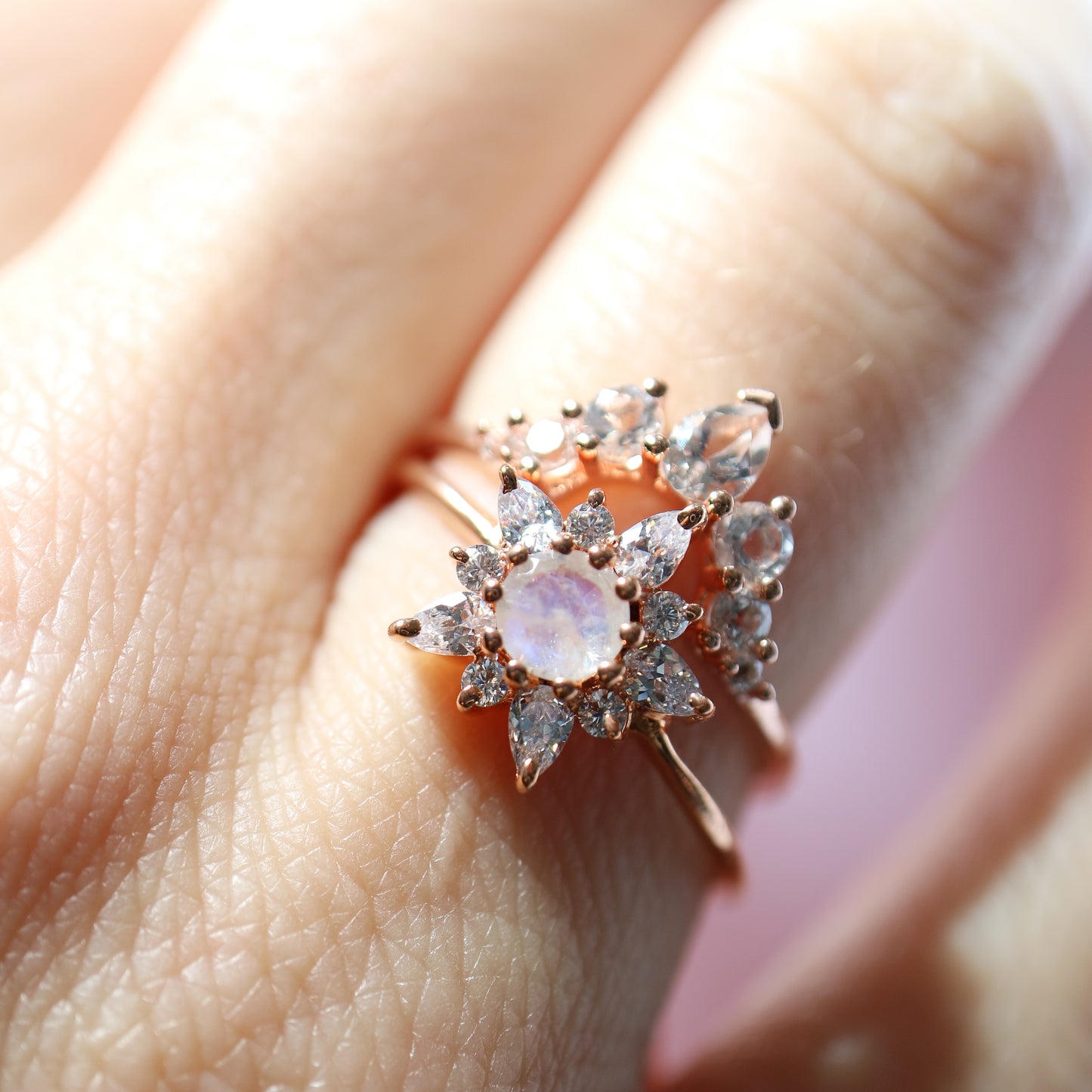 Rose gold, moonstone and topaz dancing flower ring from La Kaiser