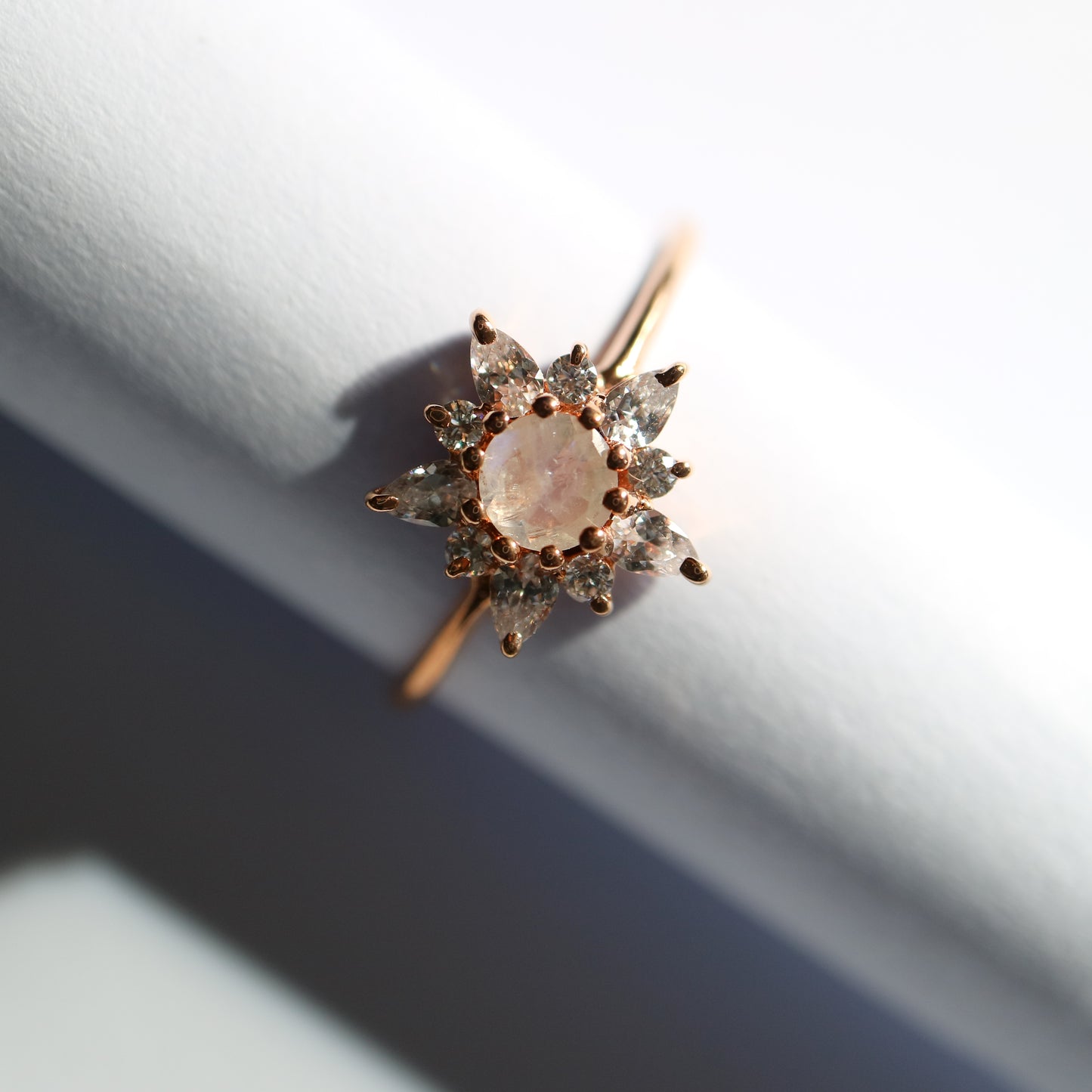 Rose gold, moonstone and topaz dancing flower ring from La Kaiser