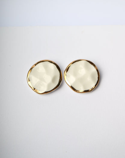 Round white and gold hammered porcelain earrings by Nina Bosch Jewellery