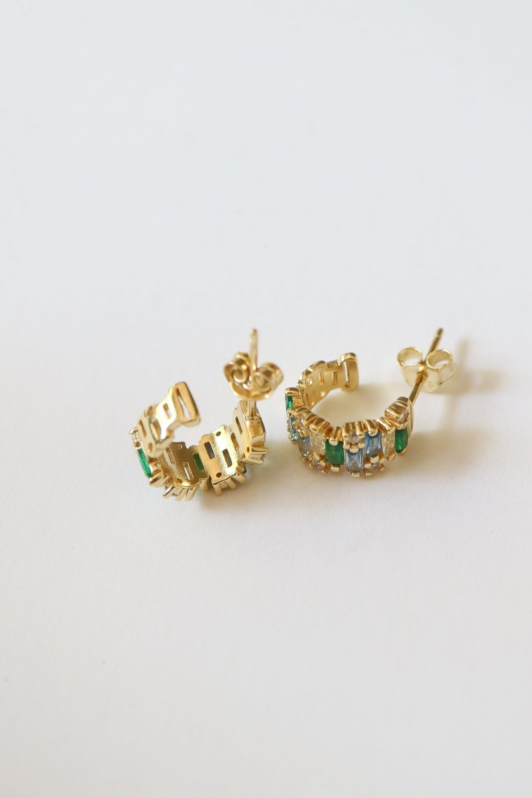 Green huggie hoop earrings