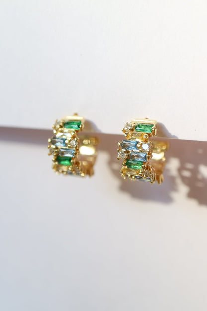 Green huggie hoop earrings