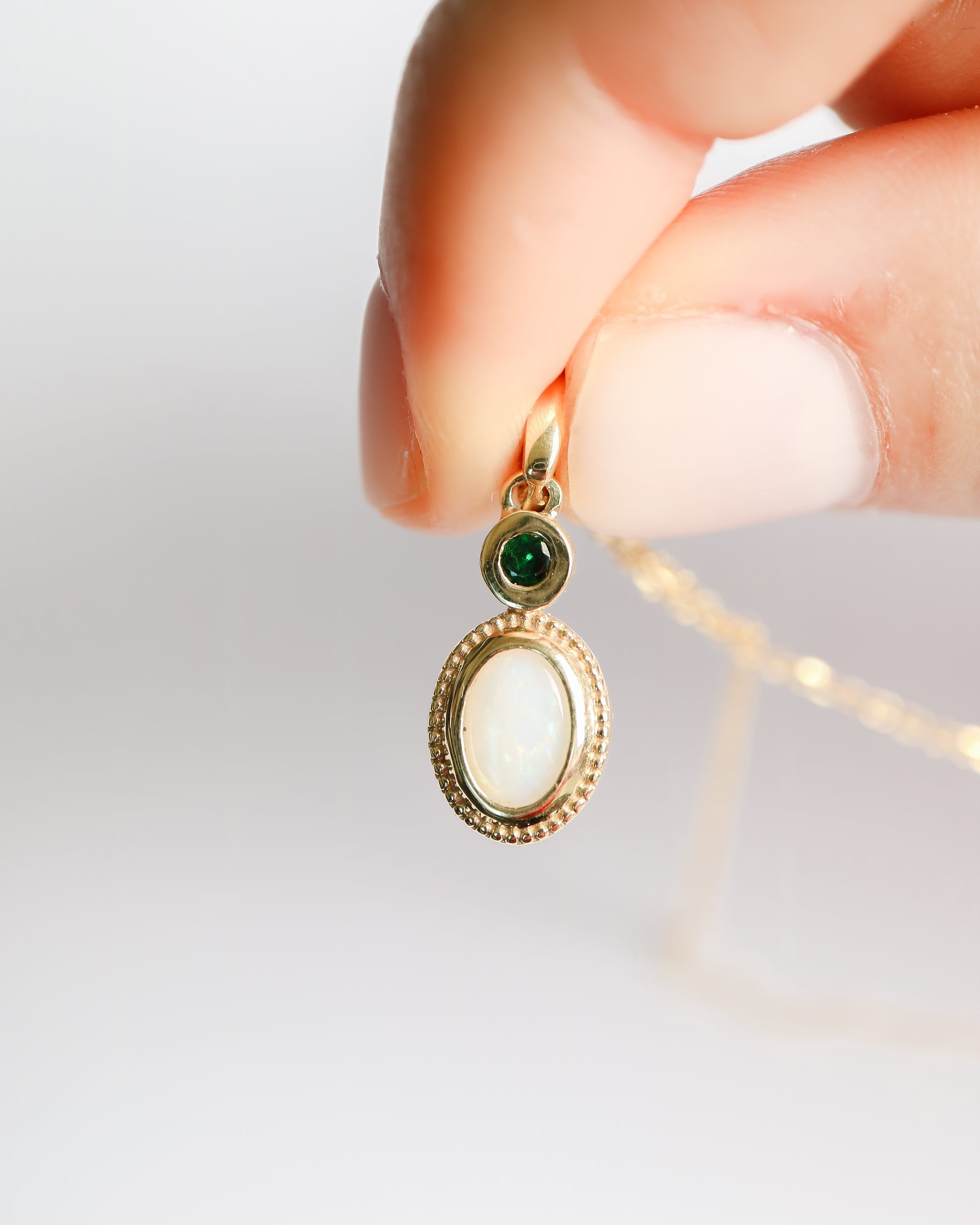 Opal and Tsavorite Pendant in 9ct gold