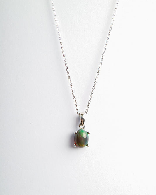 Ethiopian opal and white gold pendant