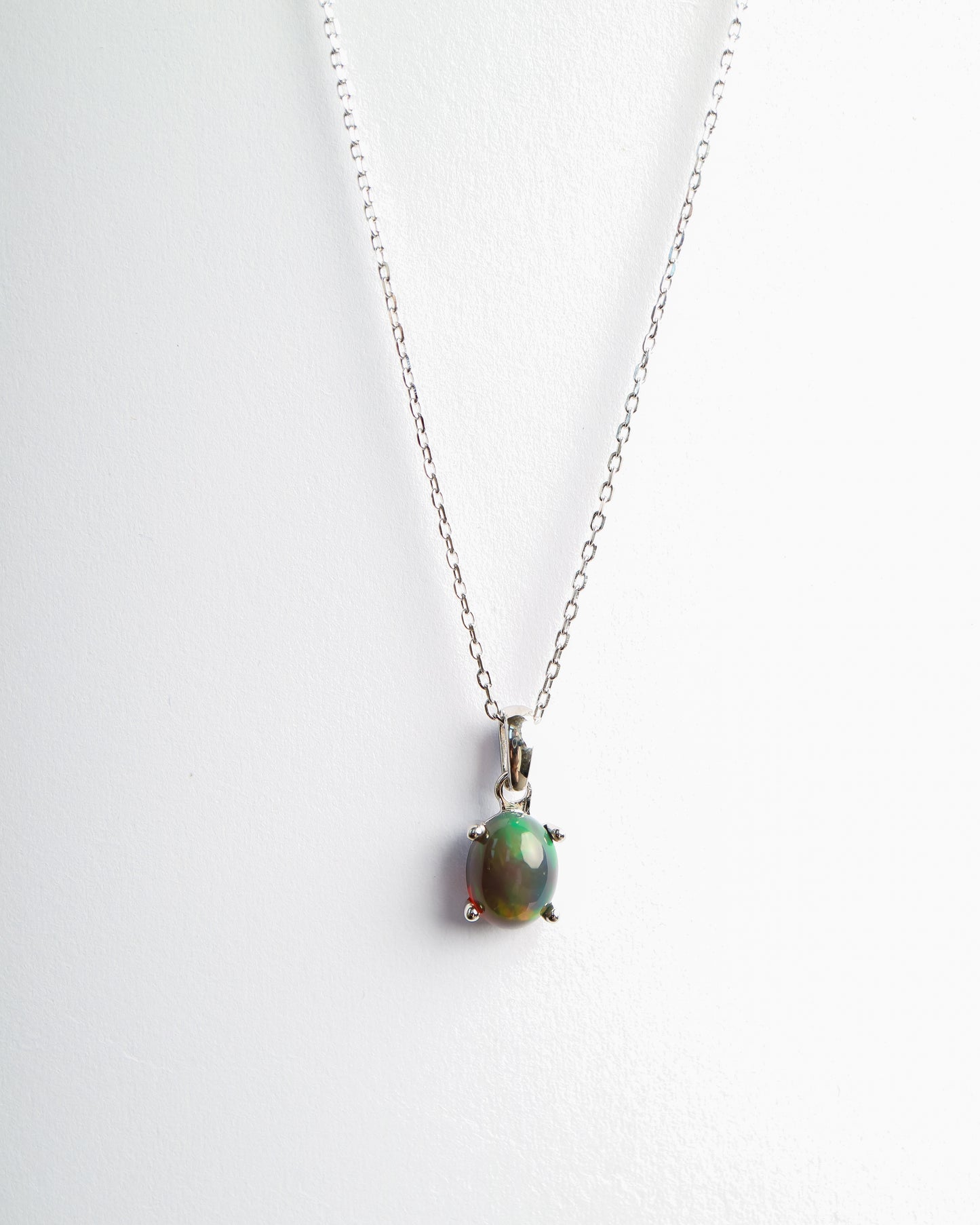 Ethiopian opal and white gold pendant