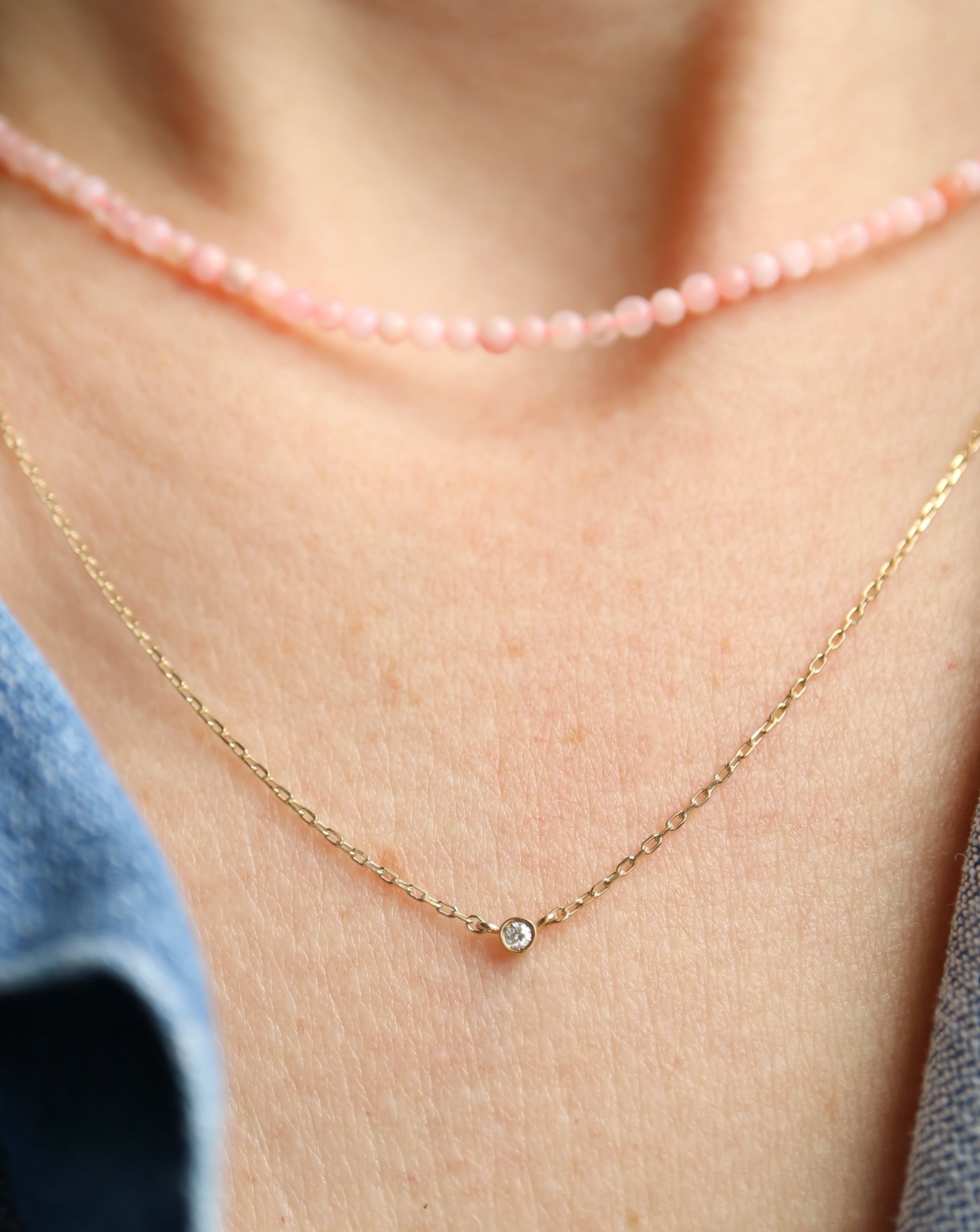 Pink Beaded Necklace layered with solo diamond necklace