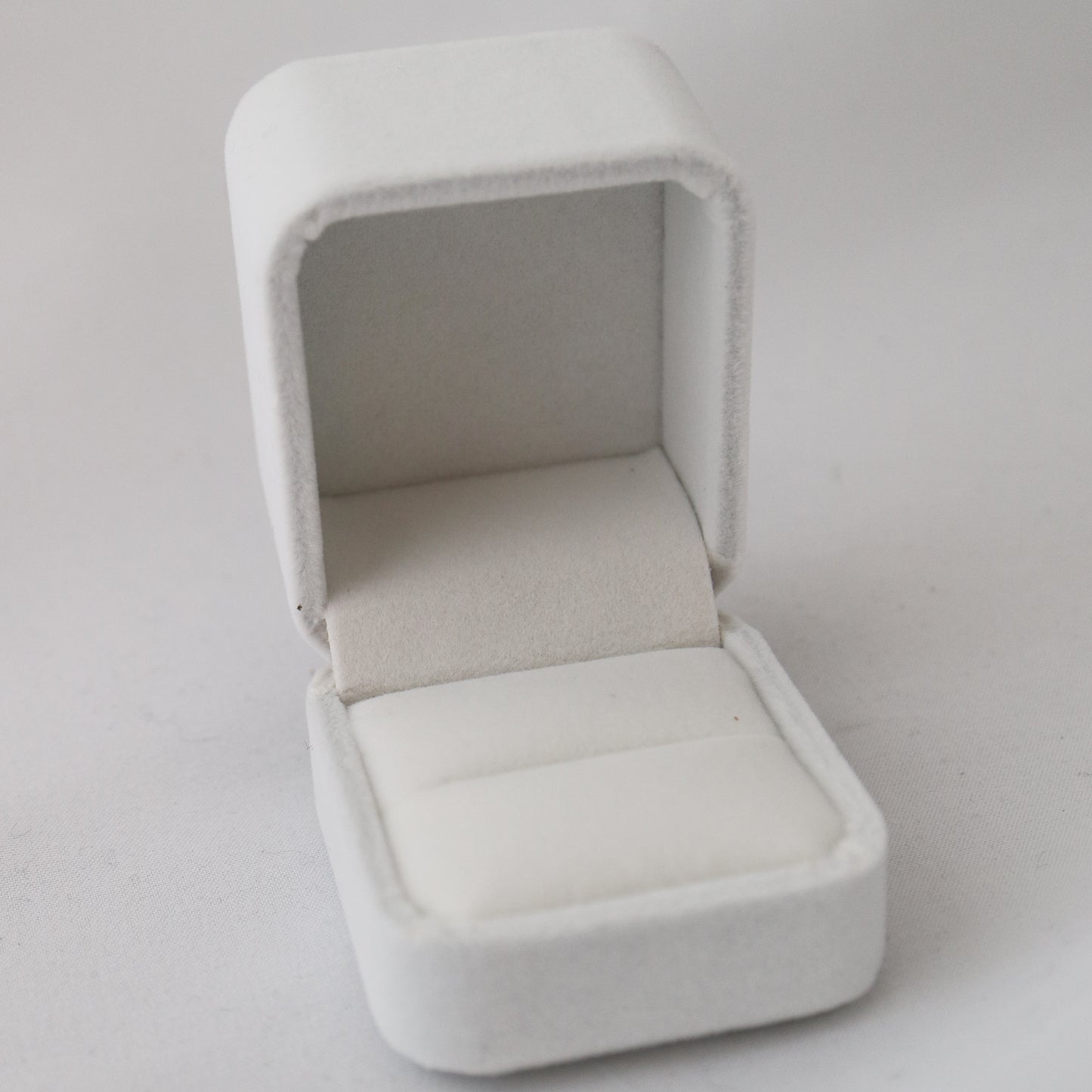 White ring box engagement ring