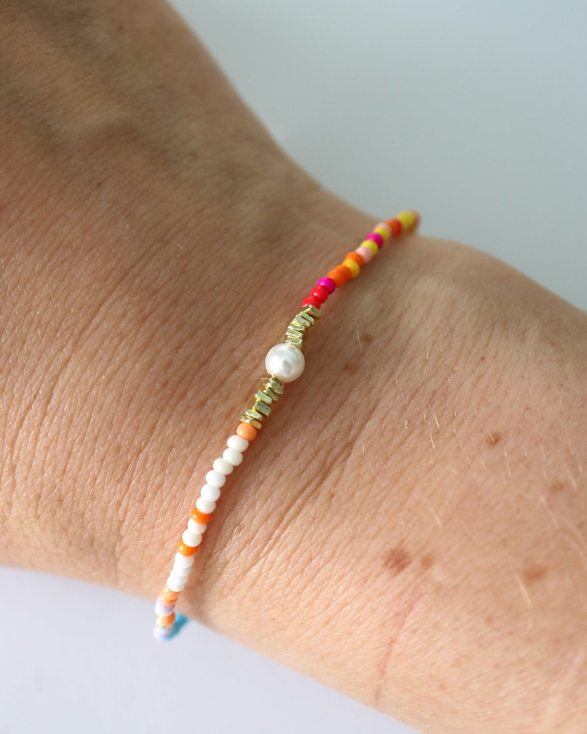 Colourful beaded and pearl bracelet finished with 14kt gold plated sterling silver