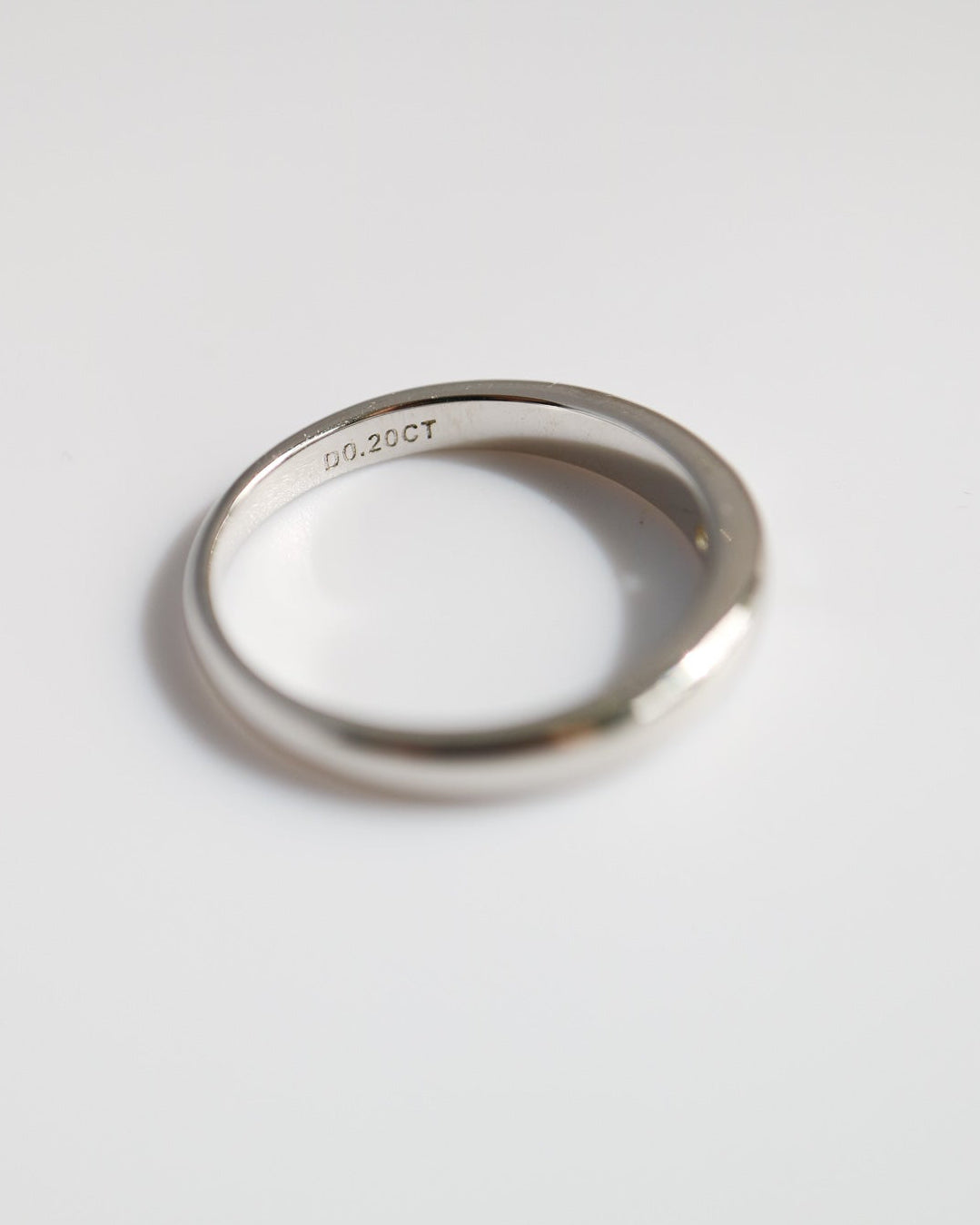 Silver ring on a white background