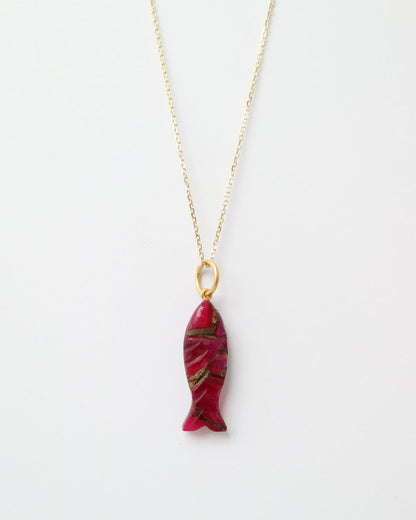 Scarlet Koi Charm featuring a hand-carved pink Mohave turquoise fish pendant with sterling silver detailing.