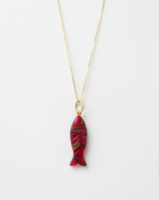 Scarlet Koi Charm featuring a hand-carved pink Mohave turquoise fish pendant with sterling silver detailing.
