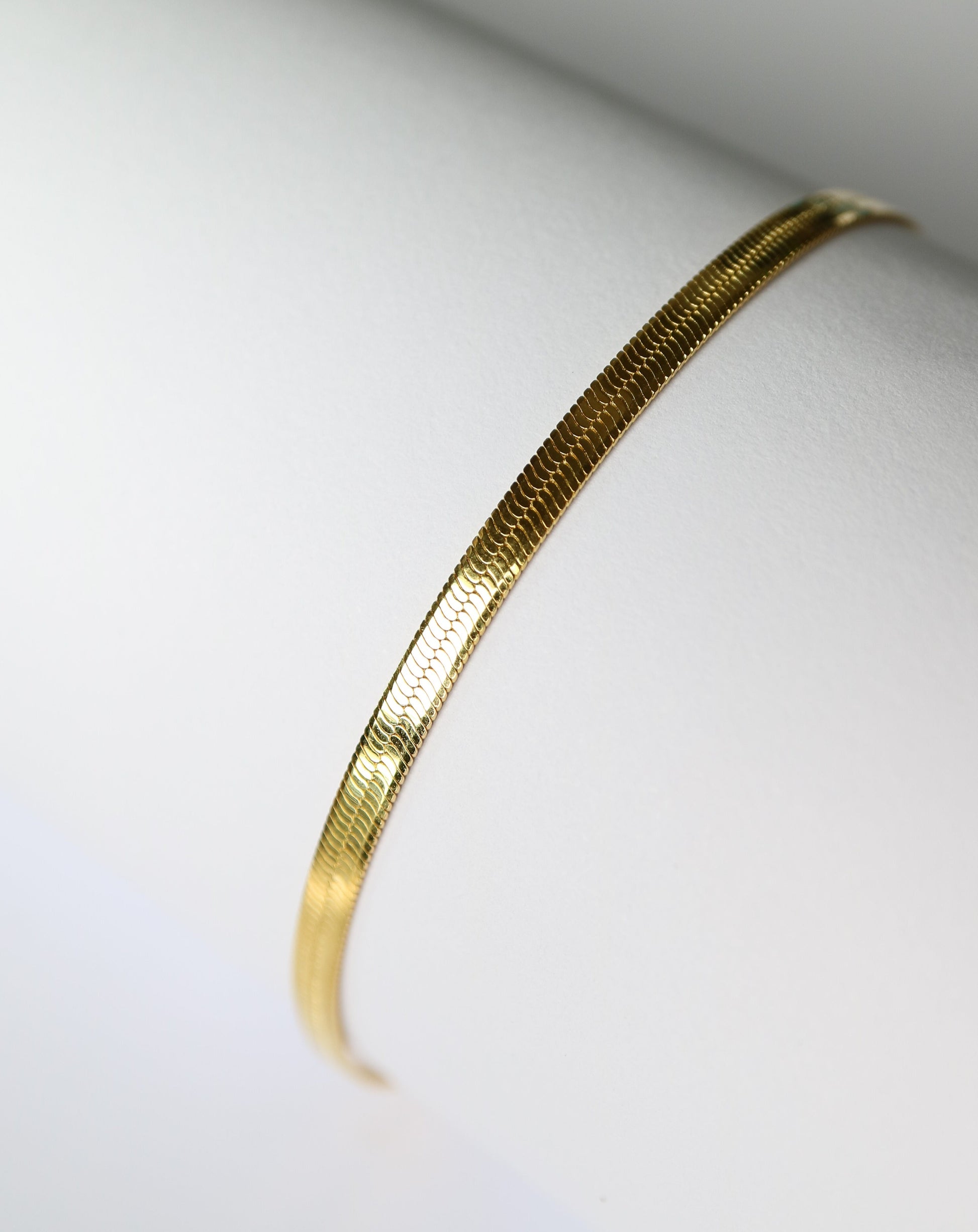 Herringbone snake bracelet in gold