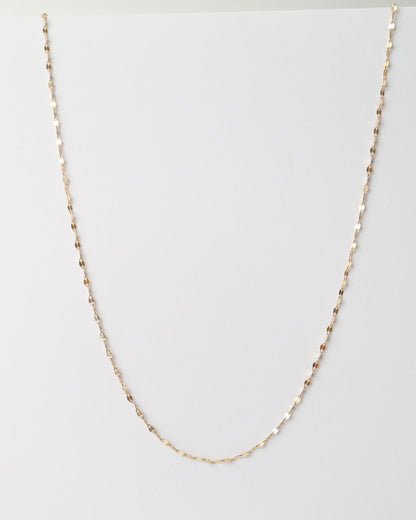 Fine 10ct yellow gold Whispers Chain with delicate faceted links and a polished finish displayed on a white background.